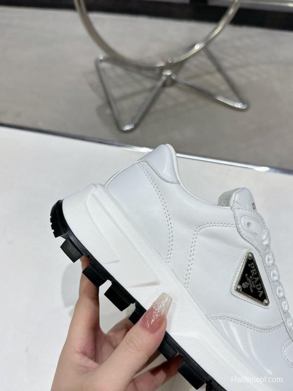 2025 Women Prada White Leather Sneakers KFY00310