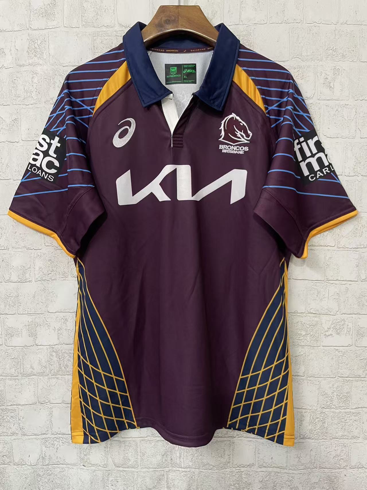 25/26 Brisbane Broncos Maroon with Blue Striped Sleeves and Gold Geometric Jersey